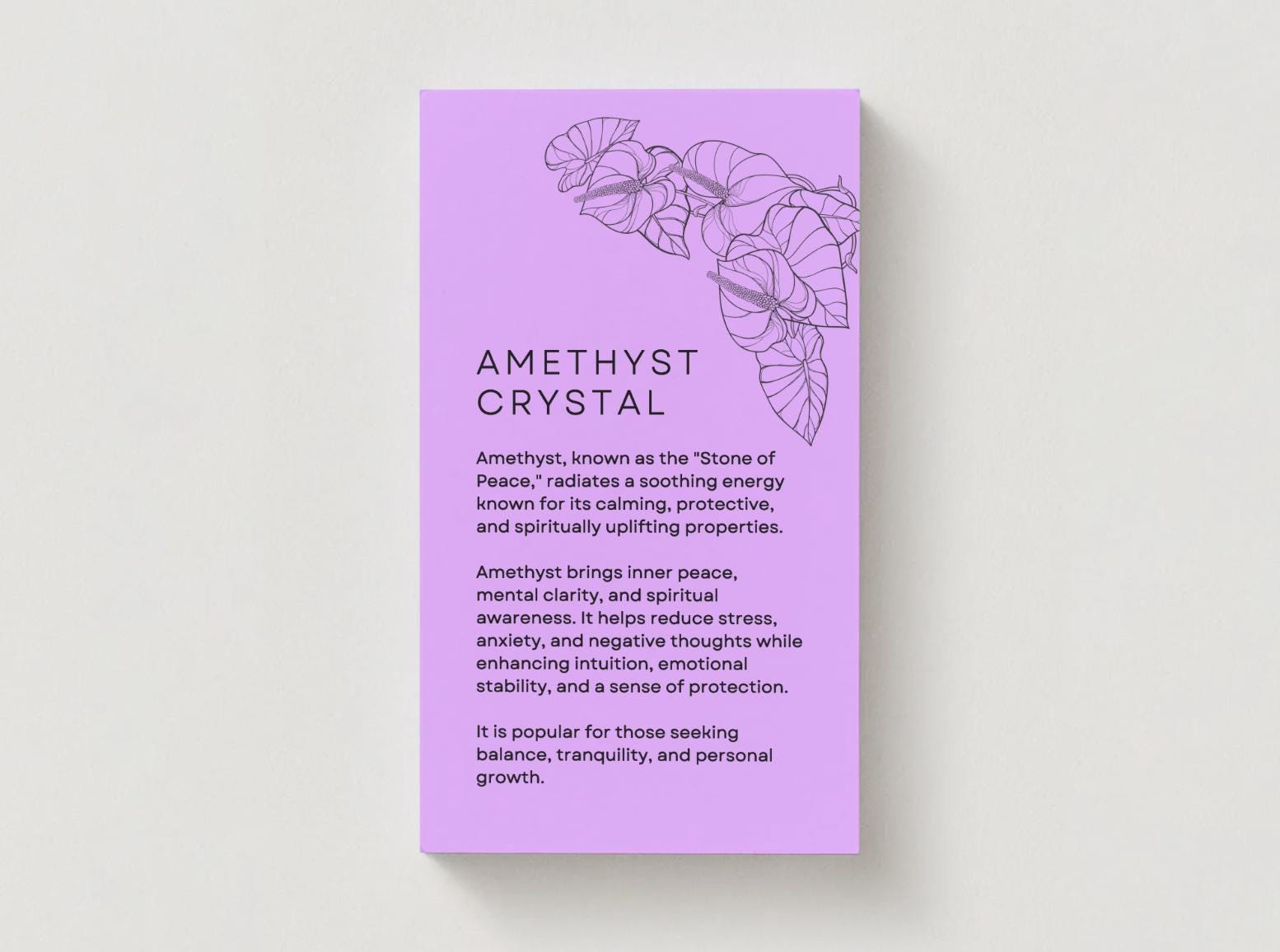 a purple card explaining the energetic meaning of amethyst crystal.