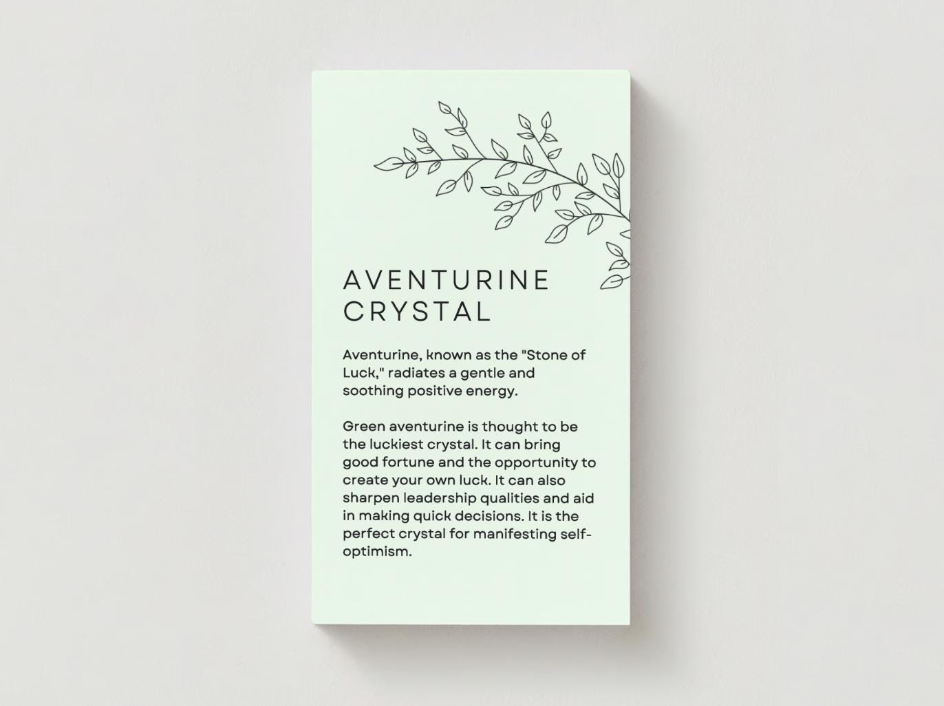 green card talking about the energetic properties of green aventurine crystal.