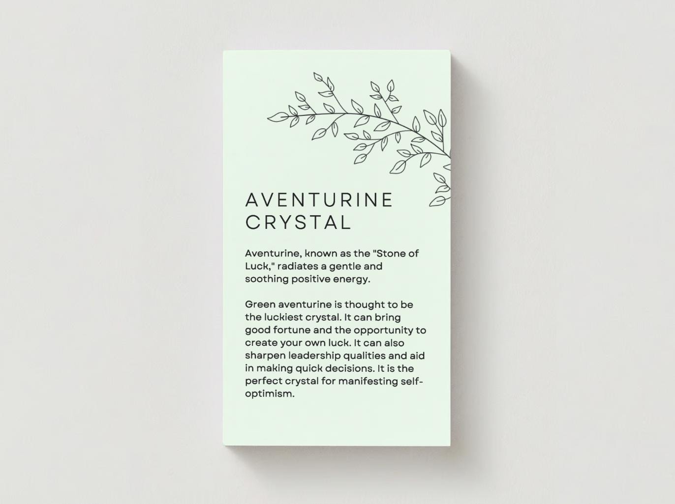 aventurine crystal meaning in a green card on beige background.