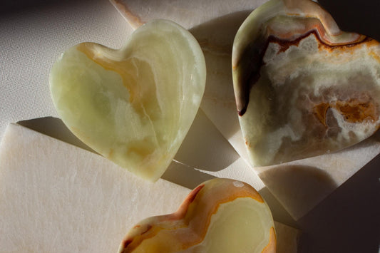 group of green heart dishes in the sunshine,