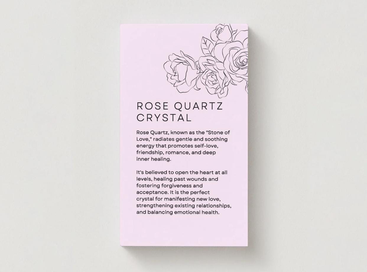 rose quartz meaning information on a pink card.