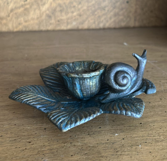 Vintage snail candle holder on a leaf base, bronze tone