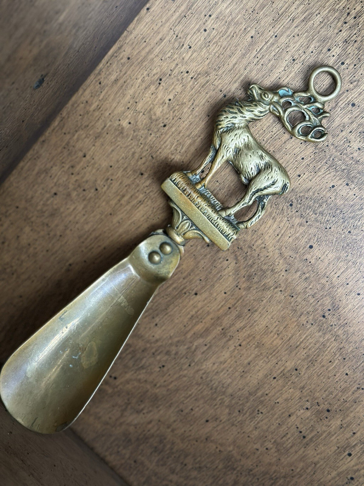Vintage brass shoe horn with figural stag handle