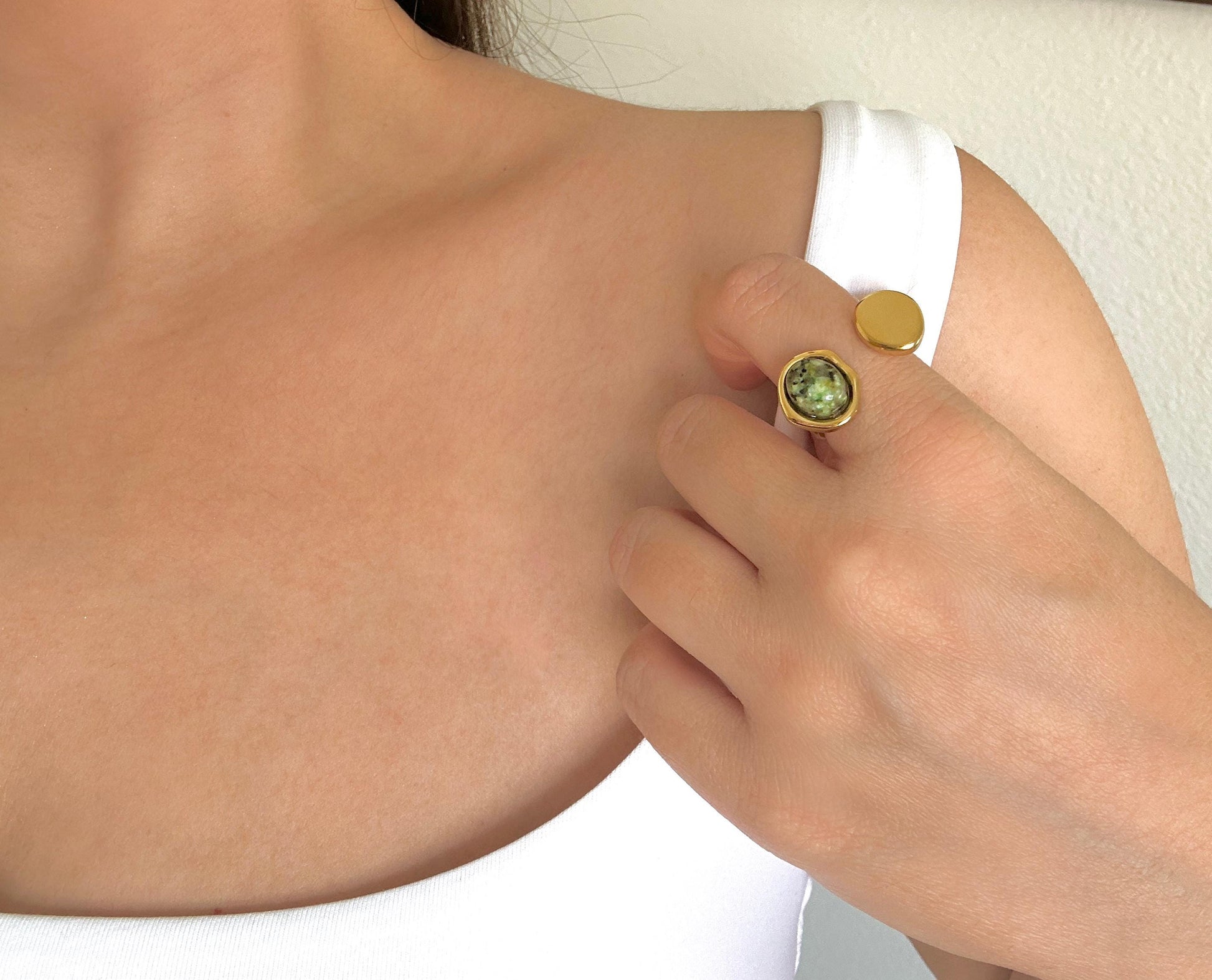 gold ring with green african turquoise gemstone.