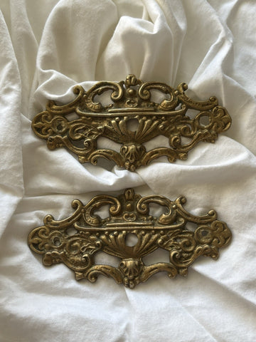 Pair of ornate Rococo brass furniture mounts